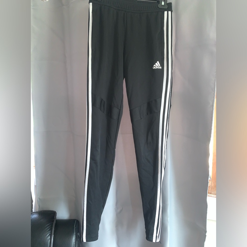 Athletic pants. The brand is Adidas. Size: xtra small. Color is black/ white.